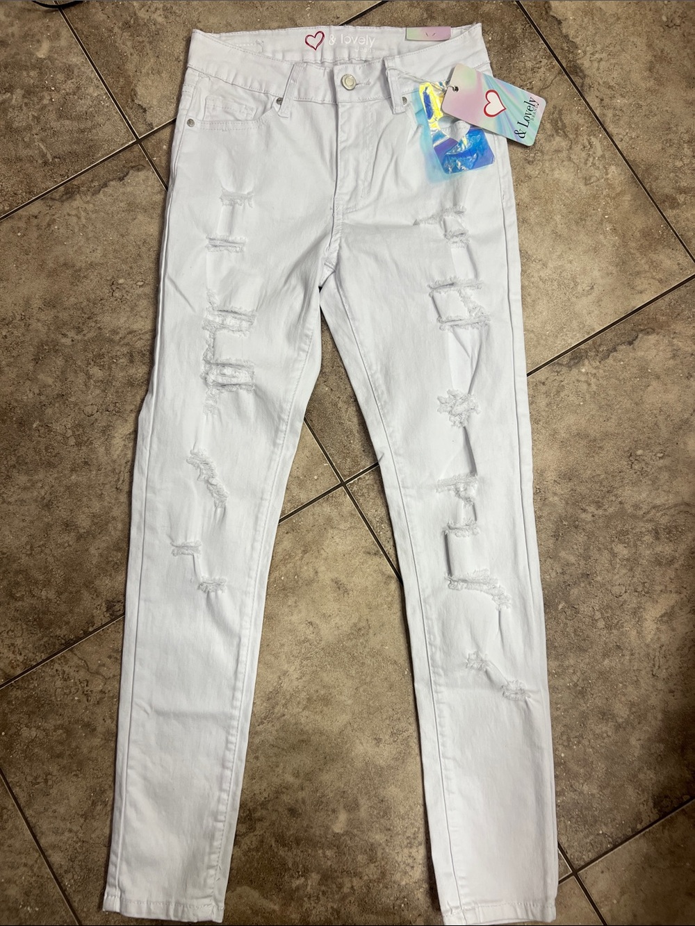 Distressed White Skinny Jeans by